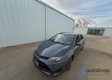 2018 Toyota Corolla L z USA, uszkodzony, nr VIN 5YFBURHE5JP784698